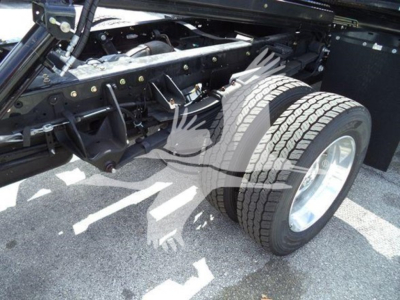 Ram 5500 chassis and dual rear wheels showing suspension and drive axle