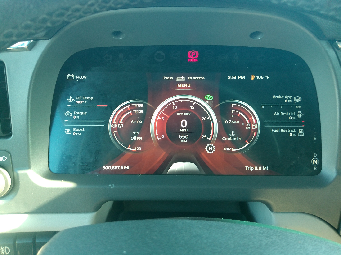 Peterbilt 579 digital instrument cluster display showing various readouts and gauges in red/black theme; left displays oil temp, torque, boost; center shows speedometer 0 MPH and RPM 650; right shows brake/app, fuel, coolant; top shows time