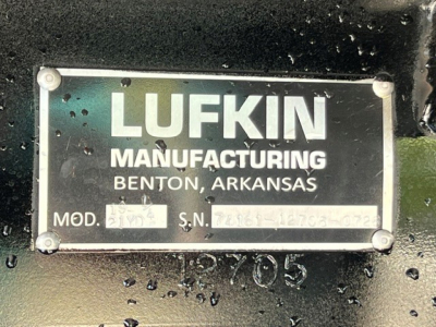 Lufkin manufacturing plate on a Mack GR104F chassis showing LUFKIN MANUFACTURING BENTON, ARKANSAS with model and serial fields partially visible.