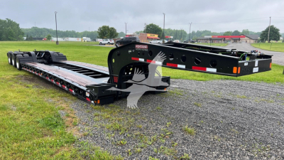 Fontaine 55 Lowboy trailer in new condition, flatbed with multiple axles and black finish, side ramps and deck details visible.