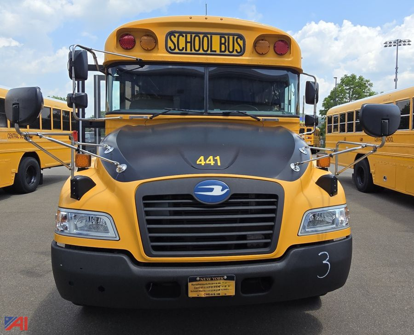Front view of a 2017 Blue Bird Vision school bus with yellow body and black hood, showing 'SCHOOL BUS' sign, grille, headlights, and number 441 on hood