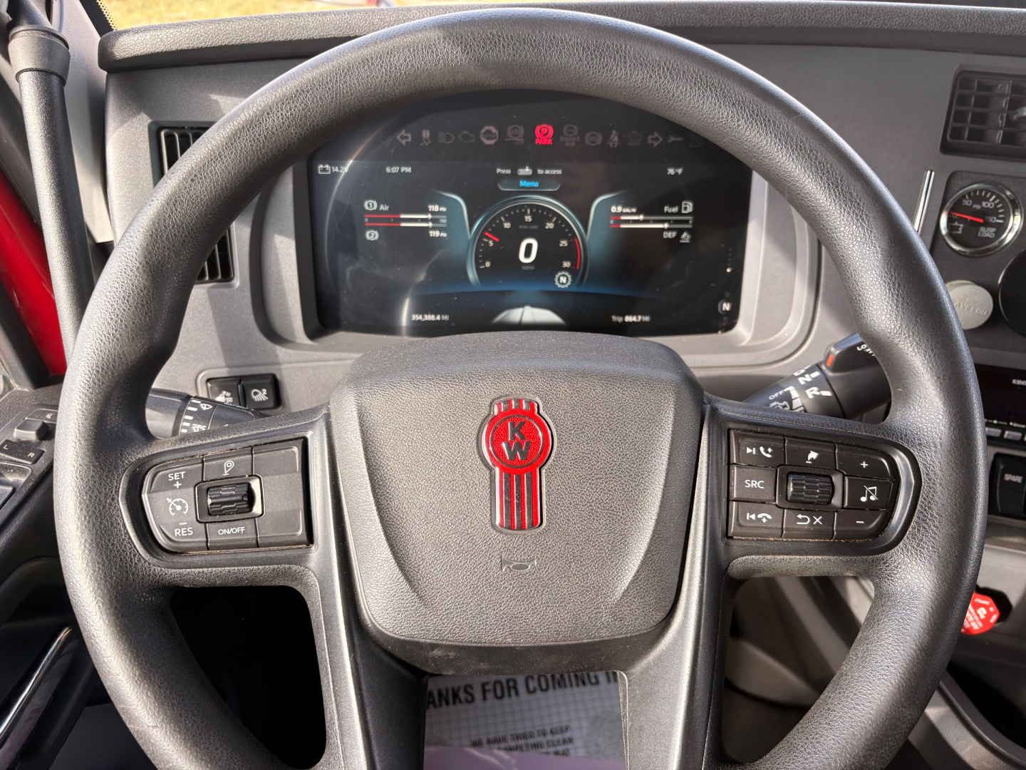 Kenworth T680 dash and steering wheel with digital gauge cluster and control stalks