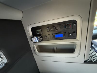 Kenworth T680 interior dash area with control panel and digital display in sleeper cab