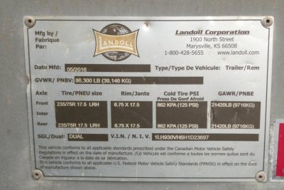 Landoll plate on trailer showing Make by Landoll Corporation, Mfg date May 2016, GVWR 86,300 lb, Tire sizes 235/75R17.5 LRH, rims 6.75X17.5, GAWR, VIN 1LH930VH6H1D23697.