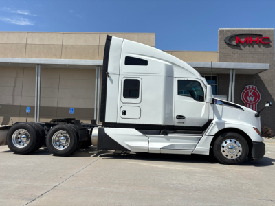 Kenworth T680 sleeper truck side view showing cab door, window, and wheel assemblies.