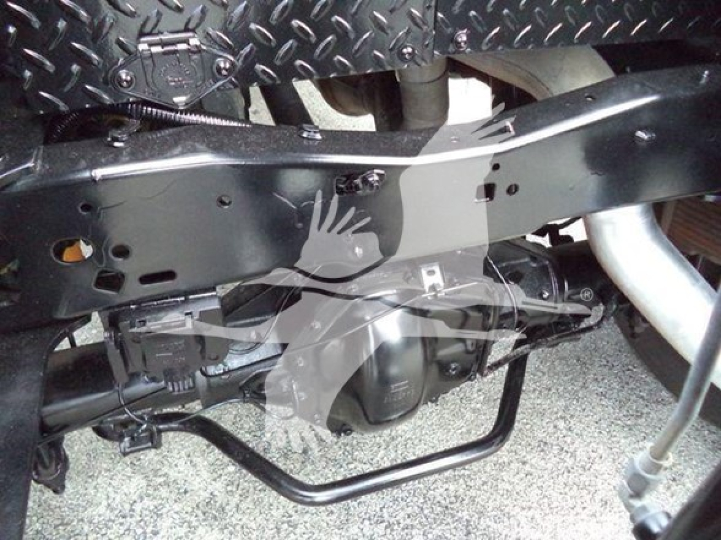 Ford F-450 2017 chassis with mid-section view showing winch mounting area and exposed frame cross member, engine bay not visible.