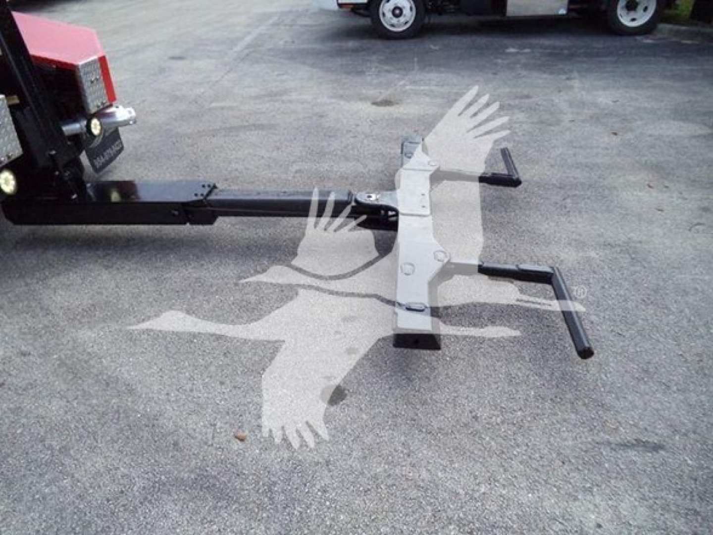 Winch mount assembly attached to a Ford F-450 truck showing a horizontal bar and mounting frame.