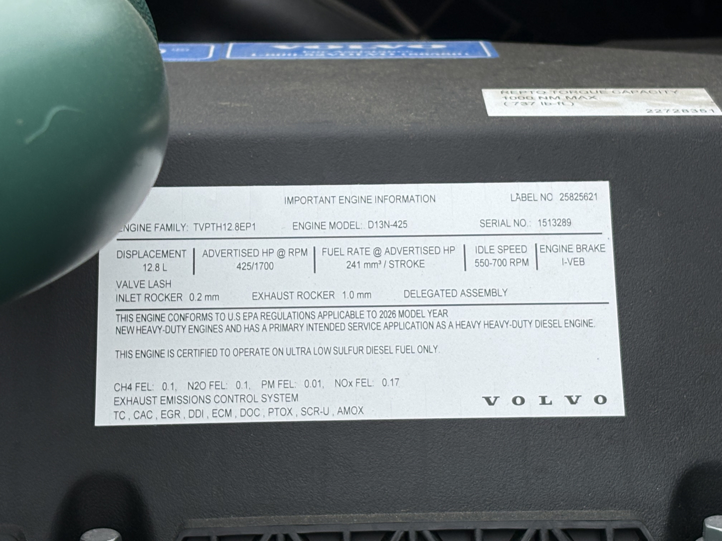 Engine label panel on Volvo VHD84F300 showing important engine information with bold headings and VIN partially visible.