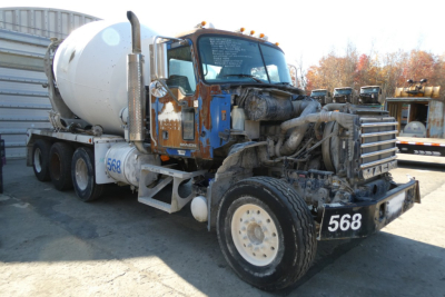 Concrete mixer truck CTP713 with front cab damage and hydraulic drum visible
