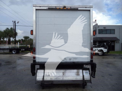 Isuzu NPR HD box truck rear view showing large white bird graphic on the cargo door and rear bumper with tailgate step.