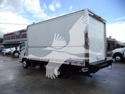 Isuzu NPR HD box truck with rear loading door, side view, faded logo stickers on cargo box.