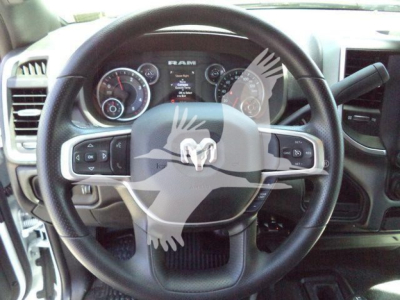 Ram 5500 HD SLT interior steering wheel and dashboard with RAM emblem and instrument cluster visible
