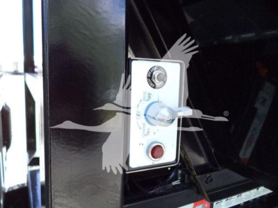 Ram 5500HD engine bay showing switch panel with OFF/ON and red push button, close-up view