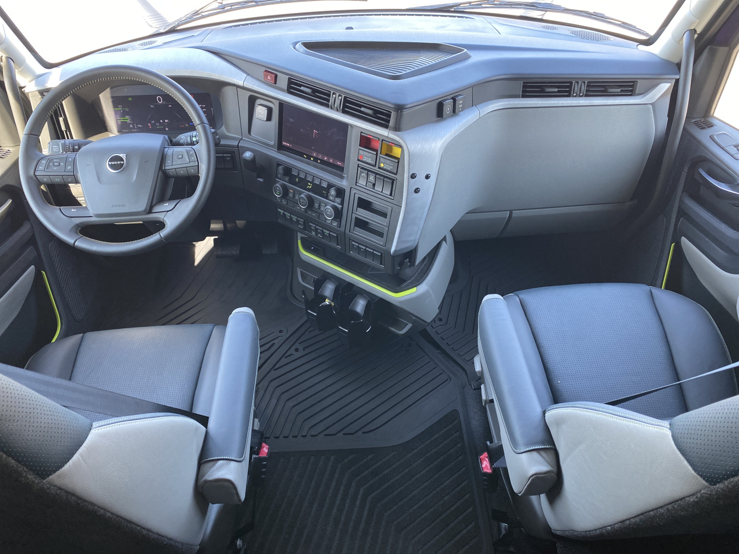 Volvo VNL interior showing 2026 dashboard center console and steering wheel.