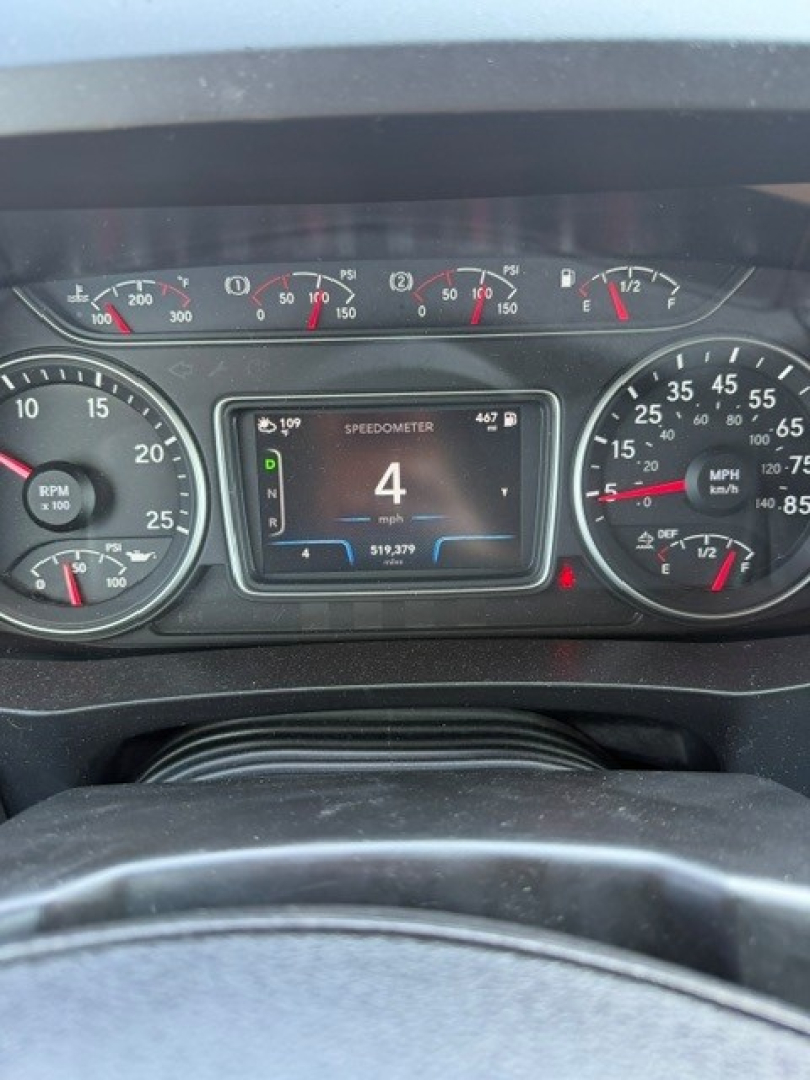 Dashboard of 2021 International LT625 showing speedometer and digital display reading 4 mph.