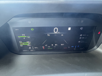 Volvo VNL64T840 dashboard display showing speedometer at 0 mph, multiple gauge readouts, and digital instrument cluster.