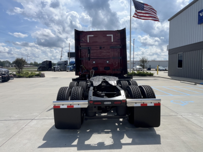 Back view of a 2026 Volvo VNL64T840 tractor showing rear wheels and fifth wheel mount.