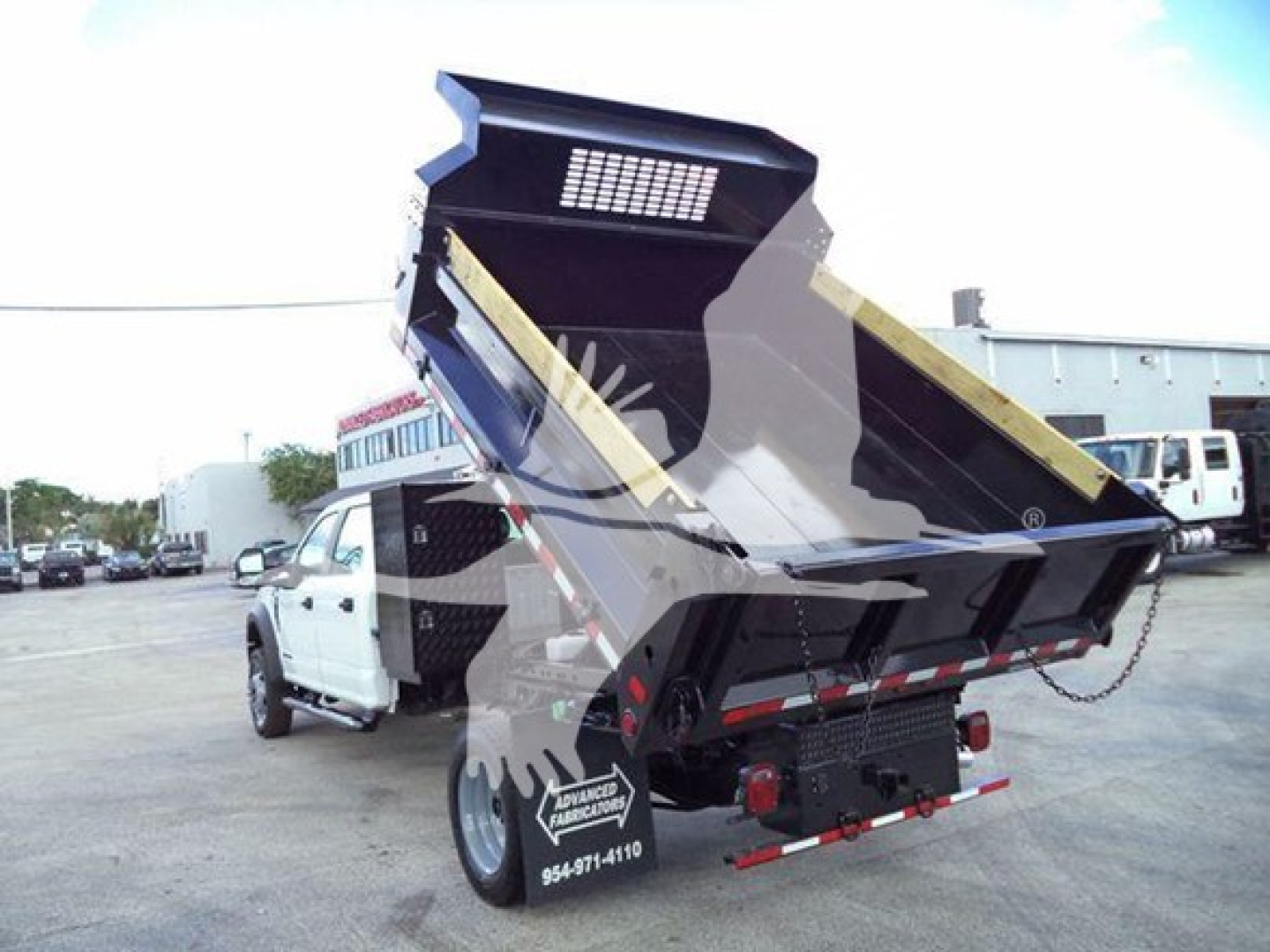 Dump truck bed raised showing hydraulic dump body on a 2018 Ford F-550 XL dump truck with stock number T20859 and VIN 1FD0W5GT7JEC20859.