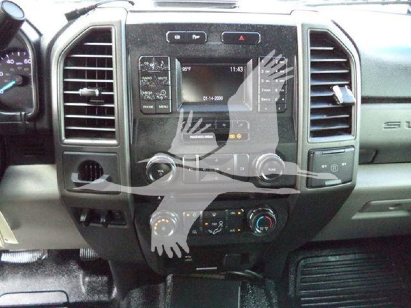Ford F-550 dash center console showing touchscreen display and climate controls
