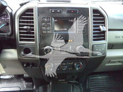 Ford F-550 dash center console showing touchscreen display and climate controls