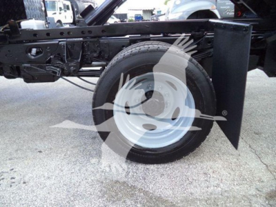 Ford F550 XL chassis side view showing front wheel and suspension components.