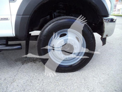 Ford F-550 front wheel and fender indicating XL trim with tire and wheel