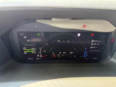 Volvo VNL dashboard display showing digital gauges, parking brake indicator, and various readouts.