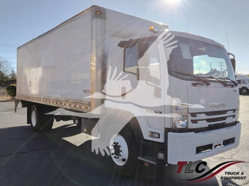 Isuzu FTR box truck side view showing cab and cargo box with white exterior.
