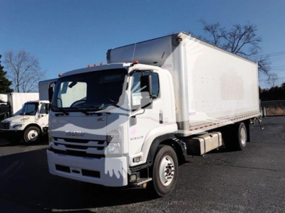 Isuzu FTR box truck side/front view showing cab and cargo box, white color, no visible branding text.