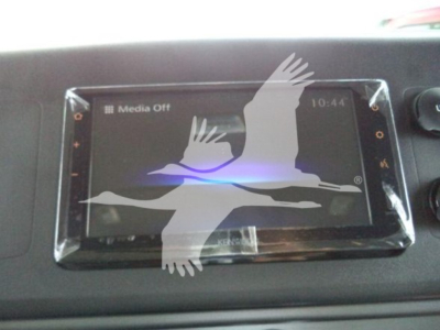 Dashboard display screen in a Freightliner M2 106 cab showing a Media Off screen with time 10:44.