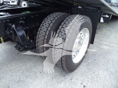 Freightliner M2 106 truck rear dual tires and chassis view in rollout configuration.