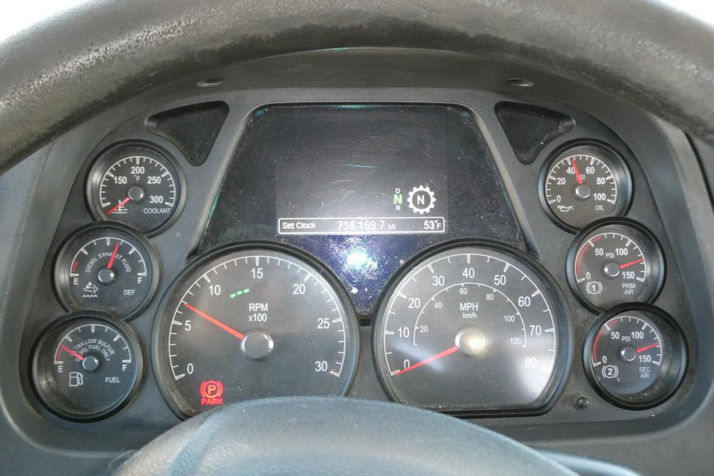 Peterbilt 579 dashboard gauges showing speedometer, tachometer, and warning lights.