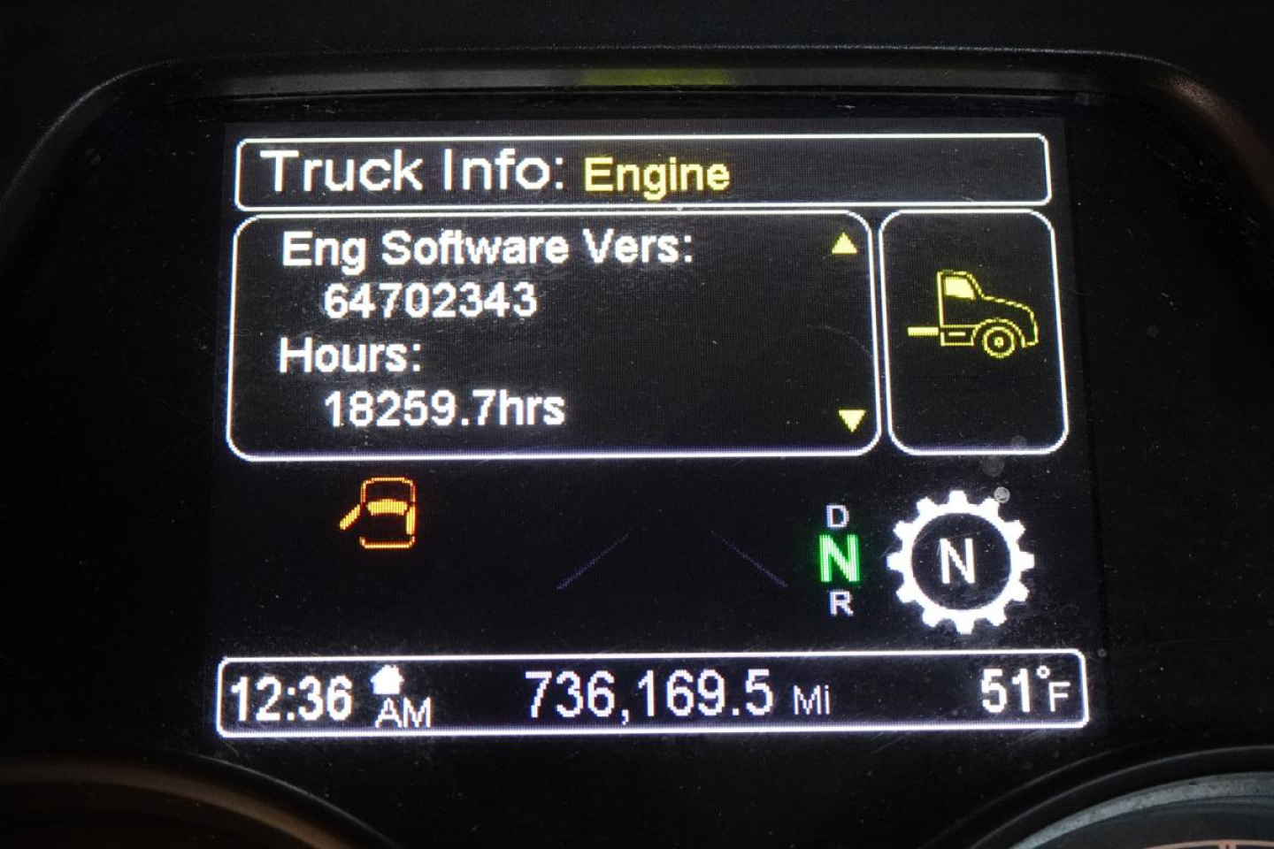 Peterbilt 579 truck instrument cluster showing Engine info, hours 18259.7, odometer 736,169.5 miles, time 12:36 AM, outside temp 51°F, gear indicator D N R.