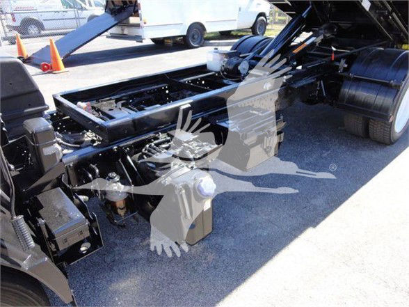 Isuzu NRR chassis frame and underbody view showing truck frame rails and suspension components.