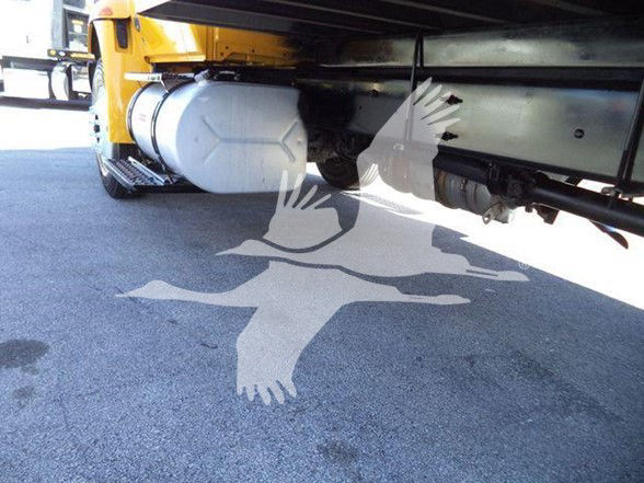 Underbelly of a 2019 International DURASTAR 4300 showing fuel tank and chassis frame.