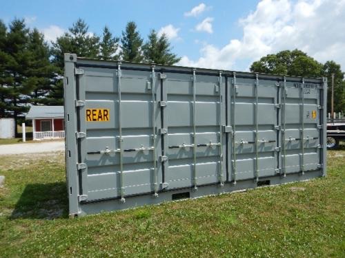 10-12? Open side shipping container with rear door panels and yellow 'REAR' sign on side.