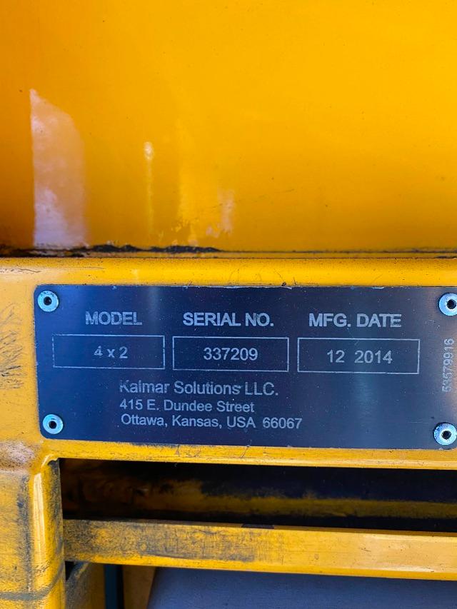 Plate on yellow yard spotter showing MODEL 4x2, SERIAL NO. 337209, MFG. DATE 12 2014, KaimaR Solutions LLC, 415 E. Dundee Street, Ottawa, Kansas, USA 66067.