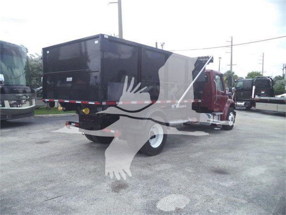 2015 Freightliner Business Class M2 106 refuse truck with a black dump body, red cab, and white rear wheels