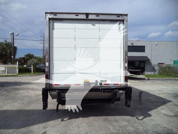 Isuzu NRR box truck rear view showing closed cargo doors and rear bumper.