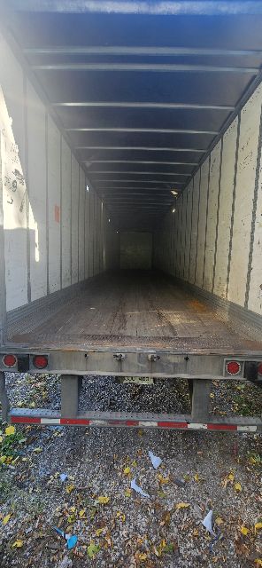Trailer interior of a 2014 Wabash dry van showing empty cargo area with metal walls and ceiling.