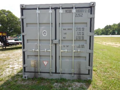 20' open side shipping container with double doors and vertical support bars; exterior with serial/stencil markings on right door.