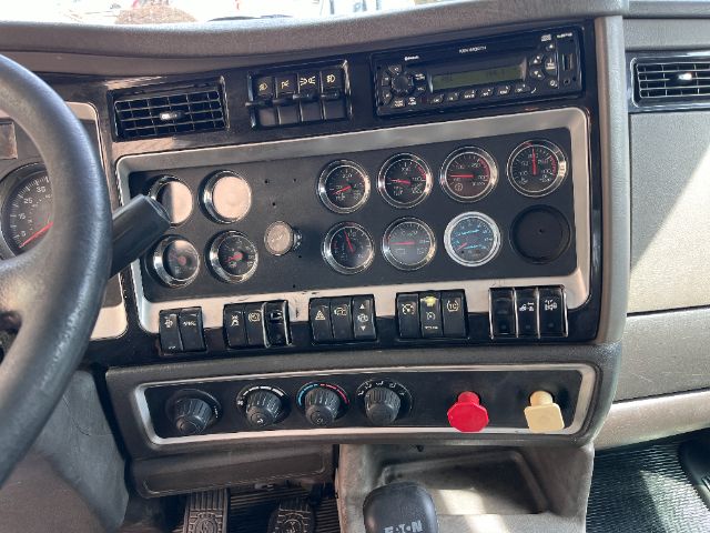 Kenworth T800 cab interior dashboard gauges and controls.