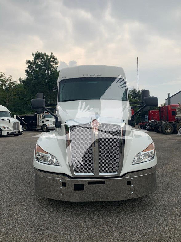 Kenworth T680 truck front view showing grille and bumper.