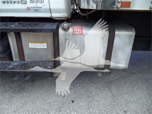 Reefer truck undercarriage showing diesel fuel only sticker on a fuel tank and side step.