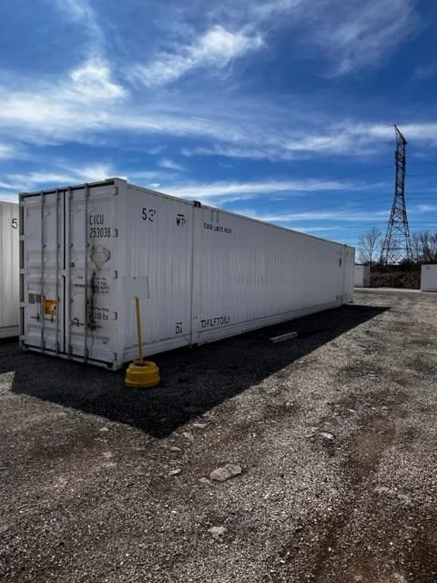 53FT CIMC intermodal dry cargo container in an outdoor lot showing doors and corrugated steel walls with serial markings and a yellow post nearby.