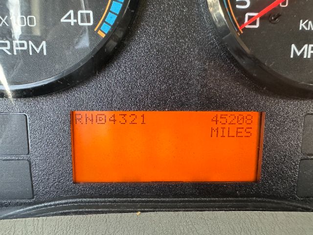 Dashboard display showing odometer reading and VIN-like code. Orange LCD shows RN04321 and 45206 miles.