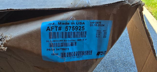 Blue label on a box reading AFT# 575925 Made in USA with ship date 01-18-2024 and various barcodes and numbers.
