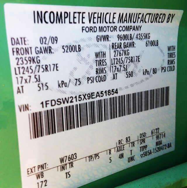 Vehicle label showing manufacture by Ford Motor Company with GVWR 9600 lb, front GAWR 5200 lb, rear GAWR 6100 lb, tires LT245/75R17E, rims 17x7.5J, VIN 1FD... (barcode present) and various weights and tire specs.
