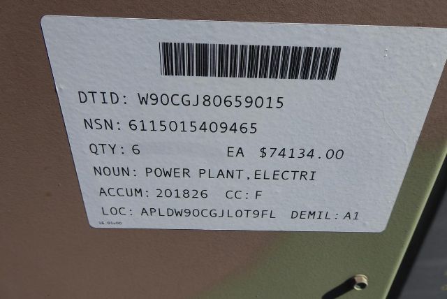 Label on power plant equipment showing bar code and text: DTID: W90CGJ80659015 NSN: 6115015409465 QTY: 6 EA $74134.00 NOUN: POWER PLANT, ELECTRI ACCUM: 201826 CC: F LOC: APLDW90CGJLOT9FL DEMIL: A1