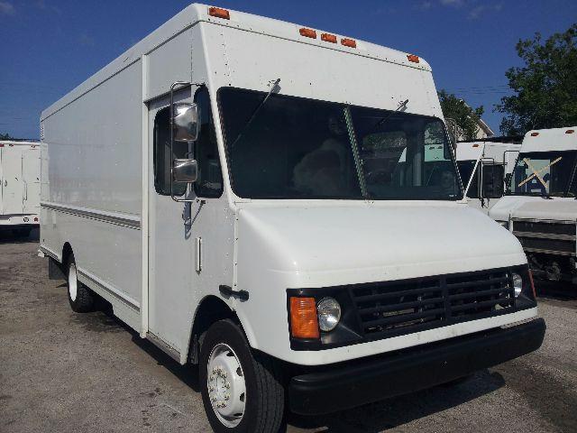 2005 Workhorse P42 step van in white, front angled view showing cargo box, cab with large windshield and side mirrors.